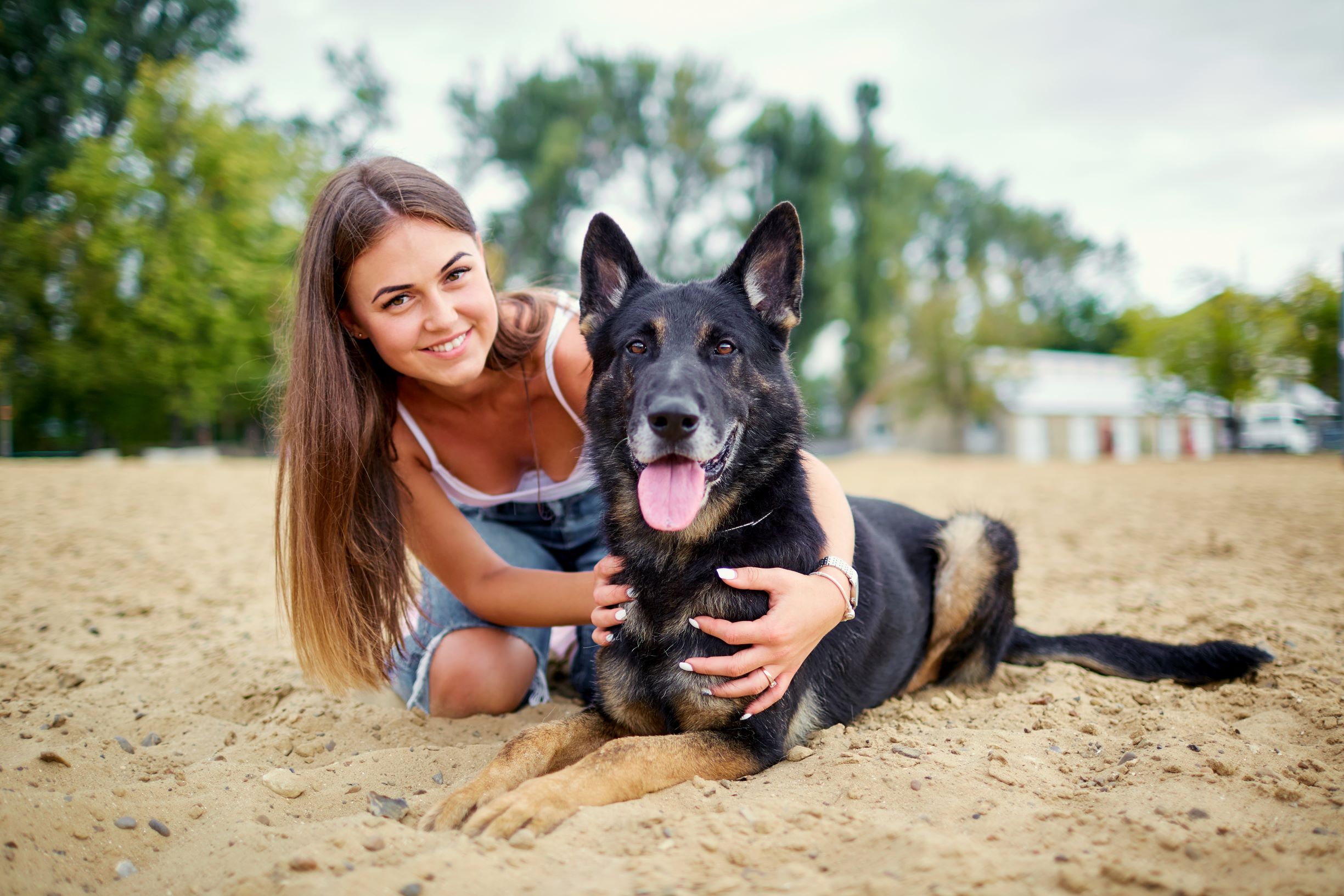 Canva - Portrait of a Girl with a Dog - Wonder Dog Training